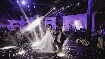 A couple celebrate one of their weddings, organised by La Table Events. Photo: La Table Events