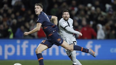 Paris Saint Germain's Lionel Messi and Montpellier's Maxime Esteve in action. EPA