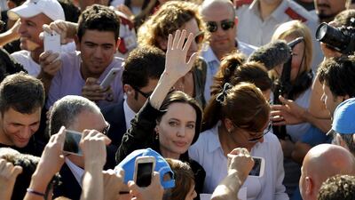 United Nations High Commissioner for Refugees (UNHCR) Special Envoy Angelina Jolie waves as she leaves a Syrian and Iraqi refugee camp in the southern Turkish town of Midyat in Mardin province. Reuters