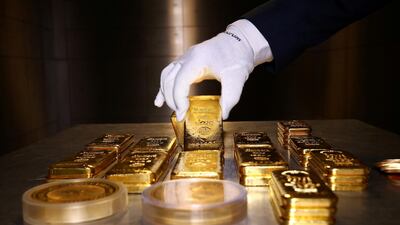 Gold bars and coins are stacked in the safe deposit boxes room of the Pro Aurum gold house in Munich, Germany. The precious metal is about $50 from its all-time high of $1920.30 last seen in September 2011. Reuters