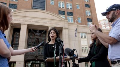 Diane Foley - mother of James Foley, an American journalist who was kidnapped and later beheaded by ISIS members in Syria in 2014 - speaks after the announcement of the guilty verdict for Elsheikh. AFP