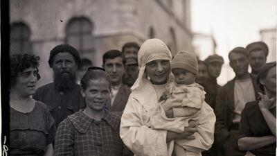 The 1917 Russian Revolution and Civil War forced millions to flee their homeland, including writer Teffi. Above, a nurse and refugees at a camp in Istanbul, Turkey, in 1922. Bettman / Corbis / Getty Images