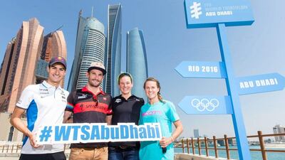 Athletes Mario Mola, Richard Murray, Katie Zafares and Flora Duffy pose during the ITU World Triathlon Abu Dhabi Press Conference on March 3, 2016 in Abu Dhabi, United Arab Emirates. (Photo by Nick England/Getty Images)