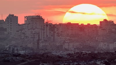 The Sun sets over Gaza on Wednesday. The best chance to relieve ongoing suffering remains with the Trump Plan to which both Israel and Hamas have reluctantly agreed. Reuters