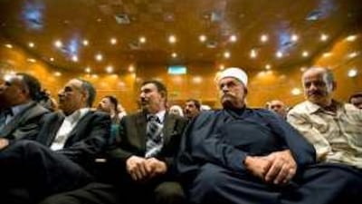 Supporters of Iraq's banned Baath Party made a show of unity at the conference, but admitted that they were split by infighting.