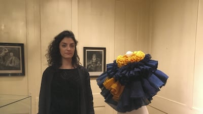 One of the artists, Nour Hage, at new exhibition London's Theatre of the East, which runs until February. Courtesy The Arab British Centre