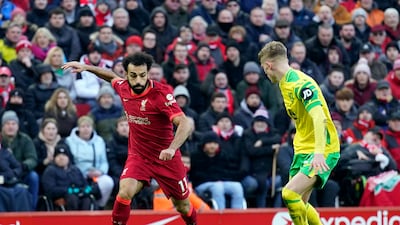 Liverpool's Mohamed Salah takes on Norwich's Brandon Williams at Anfield. EPA
