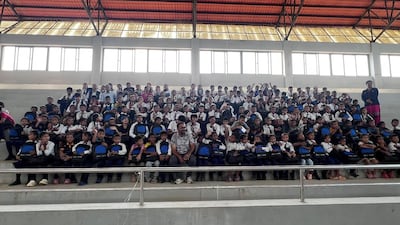 Children cheer and clap when classes resumed on September 21 in a sports academy and in tents. Photo: Rajendra Dawadi