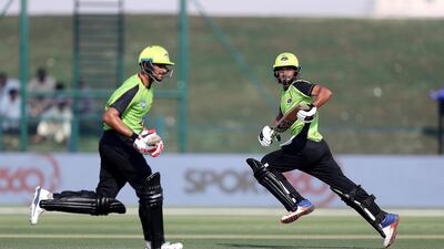Left to Right – Sohail Akhtar and Mohammad Faizan of Lahore Qalanders running between the wickets.