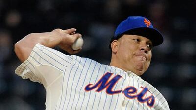 New York Mets pitcher Bartolo Colon joined Pedro Martinez and Juan Marichal as the only Dominican-born pitchers to reach 200 victories. Agency