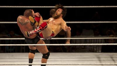 Daniel Bryan wrestles with Randy Orton at Zayed Sports City in Abu Dhabi on October 10, 2013. (Christopher Pike/The National)