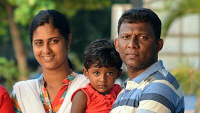 Deepa Kumar pictured with his wife, Athira, and daughter, Amulya, during a visit to his home state of Kerala, India, last year. Courtesy Kumar family