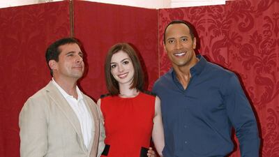 Steve Carell, Anne Hathaway and Dwayne Johnson, in a smart casual combo, attend a photo call to promote 'Get Smart' at Grand Hotel Hassler on July 7, 2008 in Rome, Italy. Getty Images