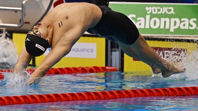 Palestine's Yazan Al Bawwab competing in the men's 100m backstroke at the World Aquatics Championships in Japan. AFP