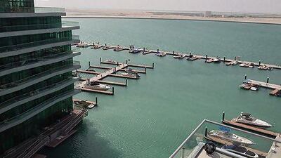 A three-bedroom apartment in Al Bandar with sea views and spacious outdoor areas. Courtesy of Rex Real Estate