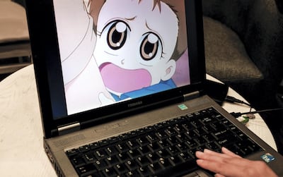 Amal records the Arabic language voiceover for a Manga-style cartoon. Victor Besa / The National