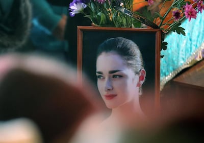 Anastasia Yeshchenko's portrait is seen during a farewell ceremony for the 24-year-old student who was murdered by her former history professor at Russia's St Petersburg State University. TASS via Getty Images
