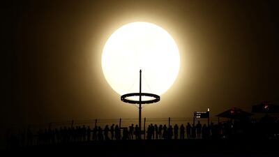 The first supermoon of the year rises next to the Marina Bay Sands Hotel in Singapore. Reuters