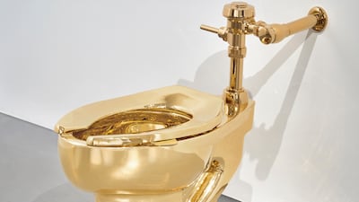 Sotheby’s has announced it will auction a solid gold toilet, a sculpture by Italian artist Maurizio Cattelan called 'America'. Sotheby's via AP
