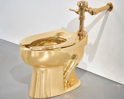 Sotheby’s has announced it will auction a solid gold toilet, actually a sculpture by Italian artist Maurizio Cattelan called 'America'. Sotheby's via AP