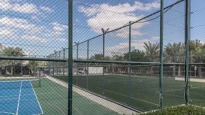Outdoor activities, including tennis, make the area appealing to the family.