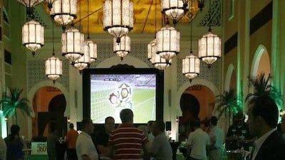Euro Cup fans gather at the Ibn Battuta Gate Hotel to watch the opening match of the 2012 season.