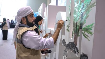 Preparing relief goods for Lebanon, at Adnec. Victor Besa / The National