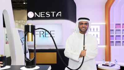 Mohammed Al Mazrouei, chief executive of Medad Holding, at the company's stand during the World Vape show in Dubai. All photos: Pawan Singh / The National
