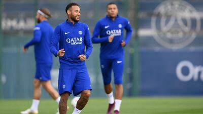 PSG's Neymar with Kylian Mbappe in the background. AFP