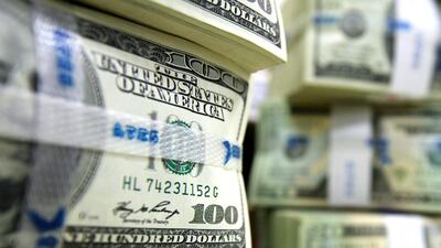 The rise in the US dollar was supported by further expectations for a shift in monetary policy from tapering to tightening in the US. SeongJoon Cho / Bloomberg News