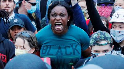A demonstrator reacts during a rally following the death in Minneapolis police custody of George Floyd, in Boston, Massachusetts. Reuters