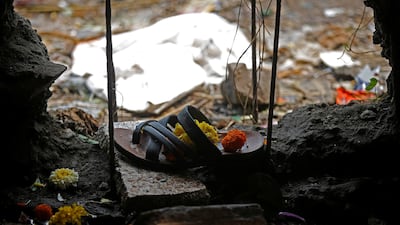 A sandal of one of the victims of a stampede is seen below a railway station's pedestrian overbridge in Mumbai, India. Shailesh Andrade / Reuters