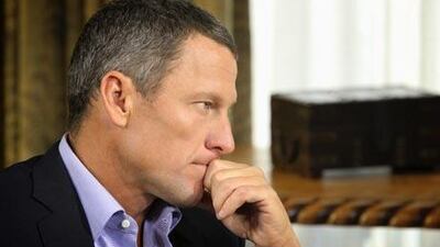 Lance Armstrong listens as he is interviewed by talk show host Oprah Winfrey during taping for the show "Oprah and Lance Armstrong: The Worldwide Exclusive" .