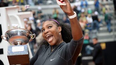 Serena Williams talkes a selfie with her Italian Open trophy after defeating Madison Keyes in the Rome final. Filippo Monteforte / AFP