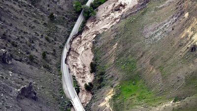 The motorway between Gardiner and Mammoth in Montana is washed out, trapping tourists, as historic flooding damages roads and bridges and floods homes along area rivers. The Billings Gazette / AP