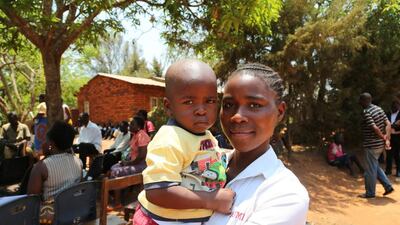 Teenager Promise Fondale, 19, with son Matthews, 3, is returning to school thanks to funding from Dubai Cares. Courtesy Sara Al Boom