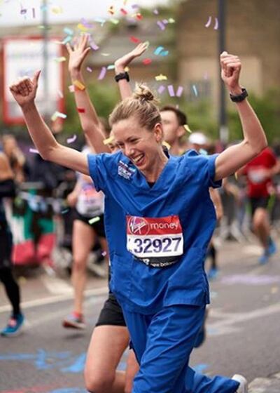 Jessica Anderson competing in the London Marathon in her nurse’s uniform. Eric Tolentino / PA