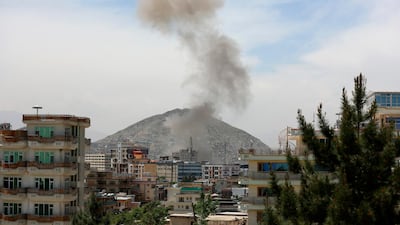 Smokes rises in the distance after the explosion. AP