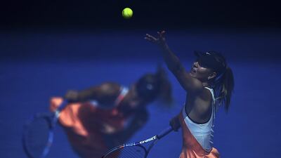 epa05126005 A multiple exposure picture shows Maria Sharapova of Russia serving against Serena Williams of the US during their quarter finals round on day nine of the Australian Open tennis tournament in Melbourne, Australia, 26 January 2016. EPA/TRACEY NEARMY AUSTRALIA AND NEW ZEALAND OUT