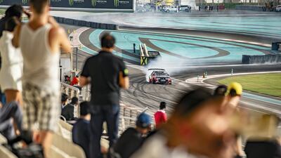 Race fans check out the action.