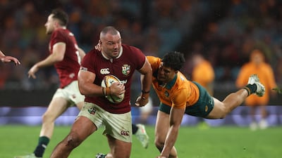 Ellis Genge of the Lions is tackled by Joseph-Aukuso Suaalii of Australia in Sydney. Getty Images