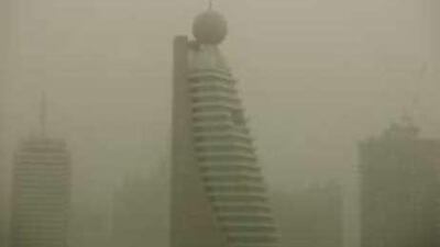 Buildings engulfed by sand on Sheikh Zayed Road, Dubai.