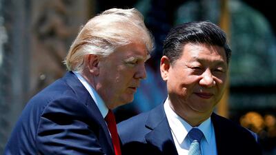 Realations between Mr Trump gestures and Mr Xi have soured since this meeting at Mar-a-Lago, Florida, in 2017. AP