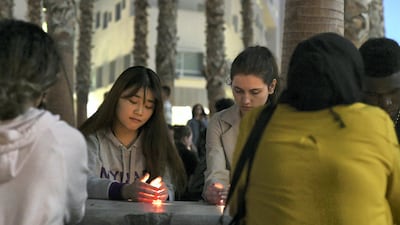 Students at New York University Abu Dhabi hold a vigil on Saadiyat Island in solidarity with the victims of the Christchurch mosque shootings and their families. Khushnum Bhandari for The National