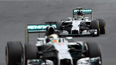Hungarian Grand Prix, July 27. Ricciardo celebrated his second win but Hamilton produced a storming drive from a pitlane start, after his car caught fire in qualifying, to third place. Rosberg, on pole, was fourth. Points: Rosberg 202, Hamilton 191. (Photo: Lars Baron / Getty Images)