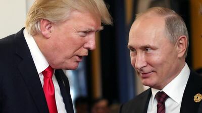 President Vladimir Putin and President Donald Trump talk during a break of a leader's meeting at the 25th Asia-Pacific Economic Cooperation (APEC) summit in Da Nang, Vietnam. EPA