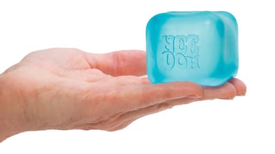 The bestselling NeeDoh Nice Cube feels soft when slow-squished and firm when fast-squished. Photo: Schylling