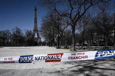 Landmarks in the French capital have been left deserted after the country was placed under lockdown. AFP