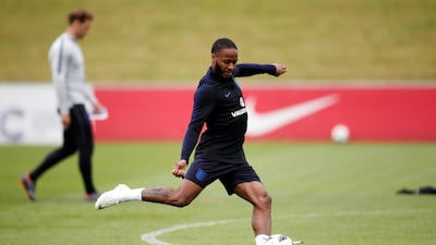 Raheem Sterling takes a shot at goal during a training session at St Georges Park on May 28, 2018 in Burton-upon-Trent, England. Carl Recine / Reuters