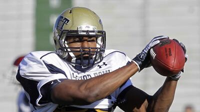 Dorin Dickerson, shown here while playing at Pittsburgh in college, made two costly plays last week for the Detroit Lions, which knocked them out of play-off contention. He later admitted that he suffered a concussion during the game. Dave Martin / AP Photo